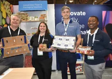 Team WestRock shows different types of packaging. From left to right: Michael McLeod showing WetTech corrugated, Kimberly Wetter showing a carton apple carrier, Andrew Freeman shows carton primary package and corrugated master shipper and Jaylen Ponder shows a topseal tomato punnet. 